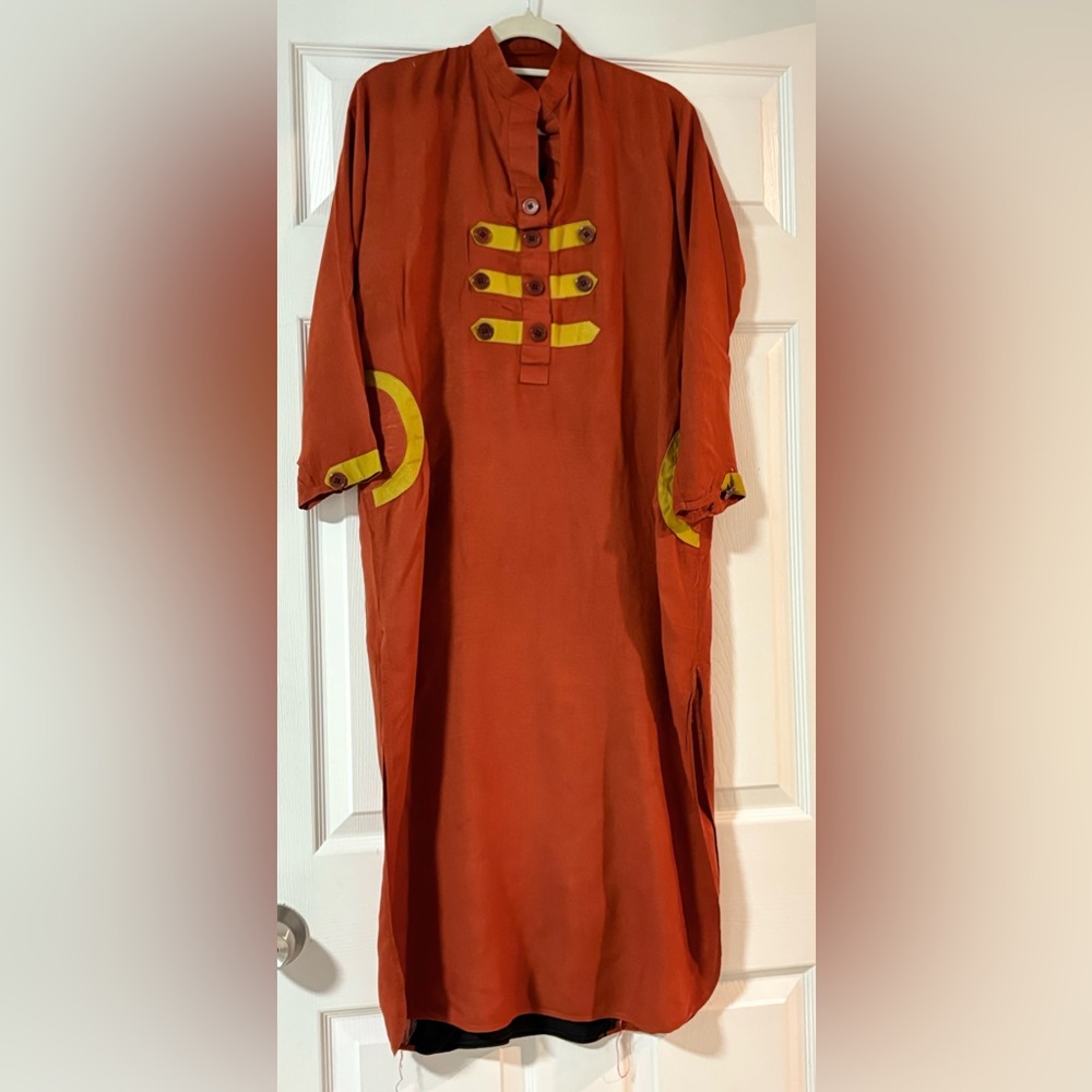 Pakistani shirt with peacock embroidery at the back side